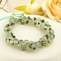 Soft green prehnite gemstone symbolizing healing, harmony, and inner peace