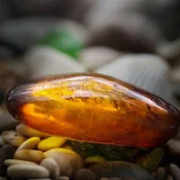 Sunstone stone with vibrant golden shimmer symbolizing positivity and vitality